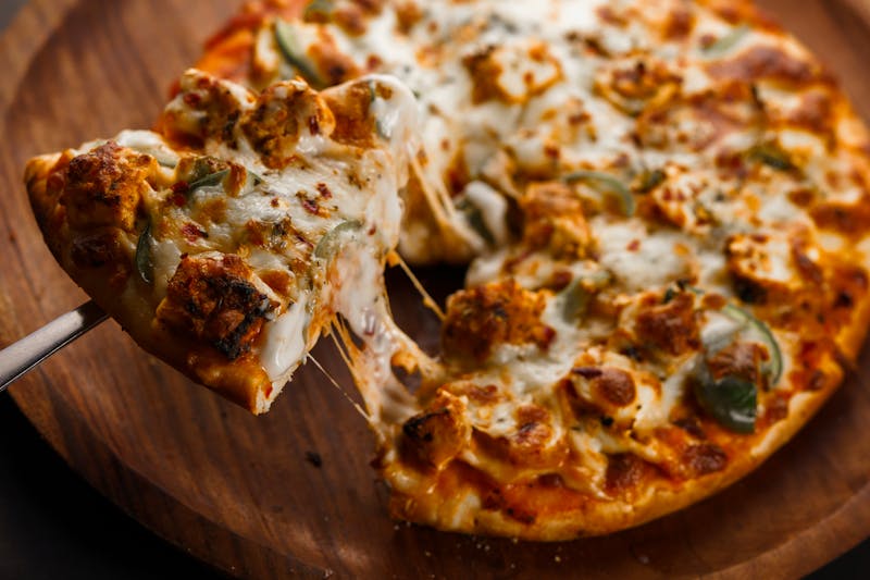 Artisan pizza being served